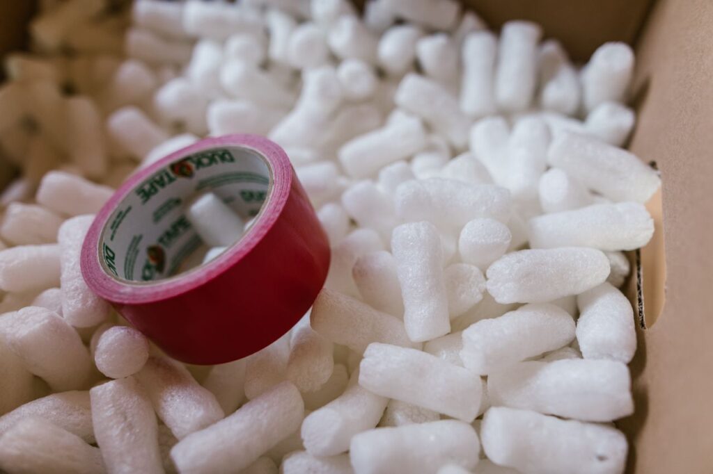 Foam packing peanuts used to cushion items in a moving box