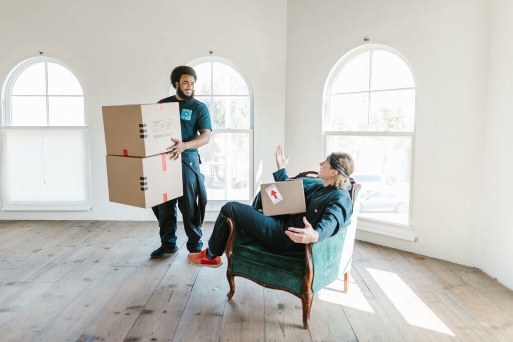 Mover consulting with a customer while comparing moving service options